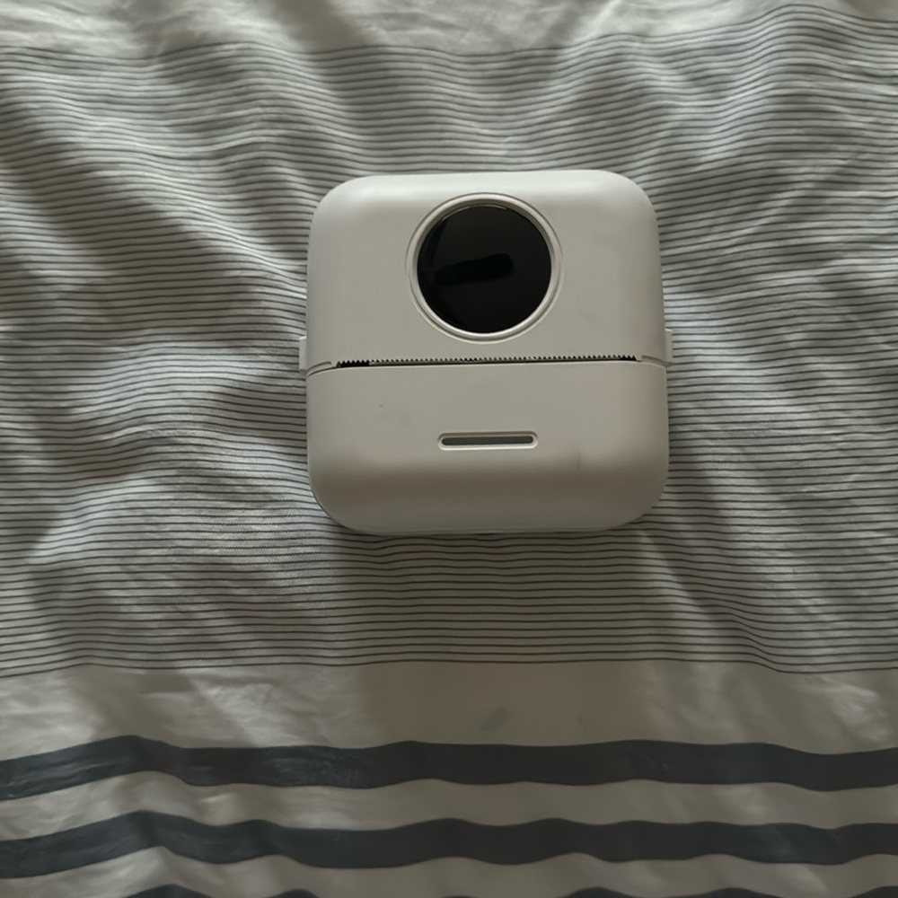 I’m selling a portable mini printer with paper. It’s brand new and still works.